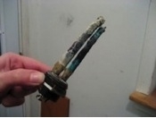 A burned heating element from a water heater