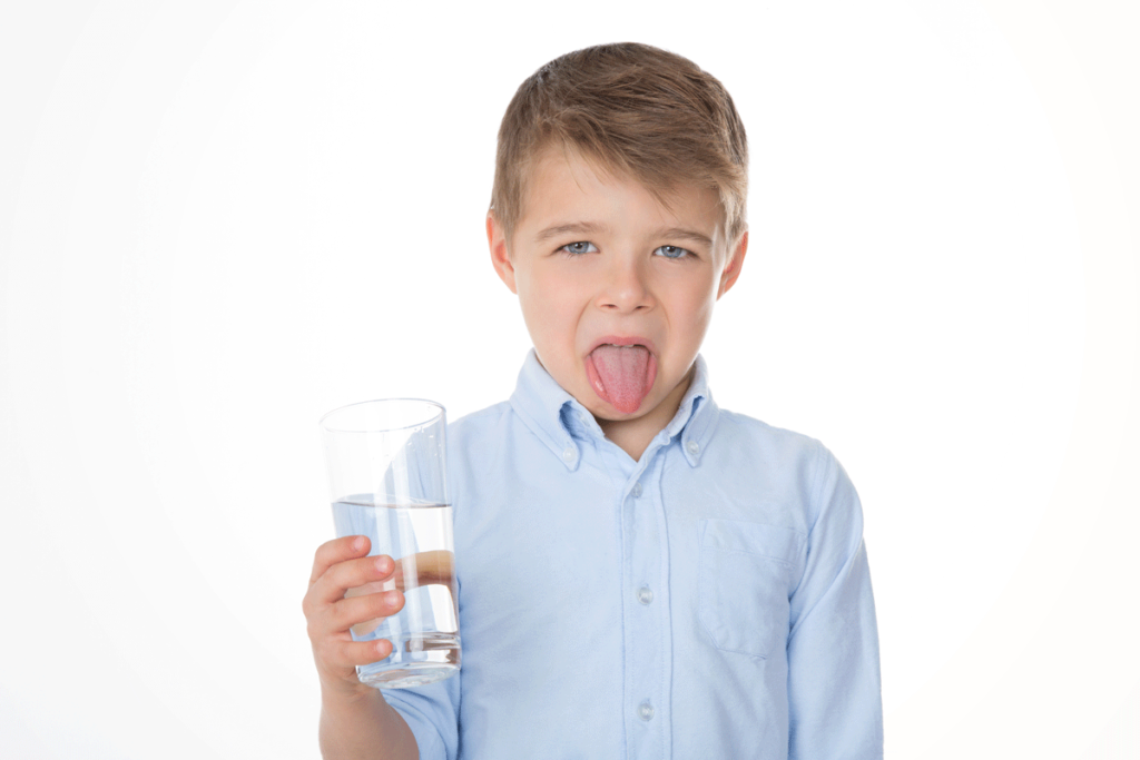 boy disgusted with water quality